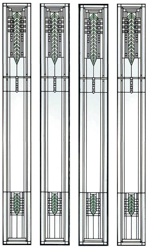 three tall stained glass windows with green and white designs