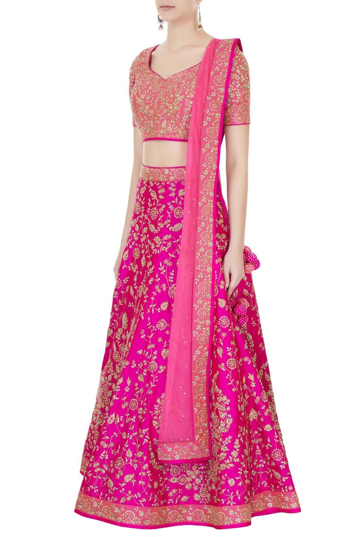 Hot pink lehenga with all-over floral motif zari work. Comes with embroidered blouse and dupatta. 
Components: 3
Neckline:  Leaf
Sleeve Length: Half 
Tassel tie-up back  
Closure: Blouse: Side zip   - Aza Fashions Hot Pink Lehenga, Leaf Sleeve, Pink Lehenga, Embroidered Lehenga, Pink Leaves, Zari Work, Embroidered Blouse, Set For Women, Aza Fashion