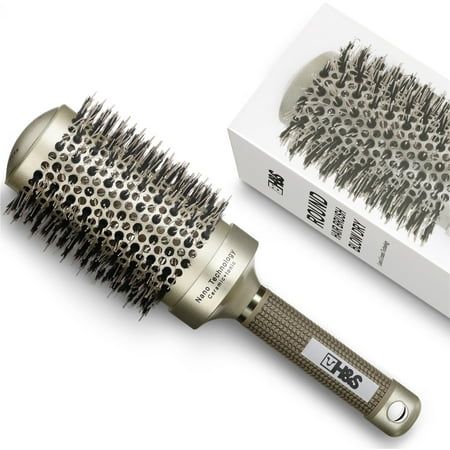 Elevate your hair styling routine with the H&S Wooden Round Hair Brush. Crafted with natural boar bristles, this versatile brush efficiently blow-dries and styles hair of all types, from thick and frizzy to straight and wavy. Its advanced ceramic plate and nano technology reduce drying time, saving you precious time and effort. The ergonomic, non-slip handle ensures a comfortable grip, while the wide openings facilitate optimal airflow for professional-looking results. Whether you're creating vo Round Hair Brush, Nano Technology, Advanced Ceramics, Loose Curls, Ceramic Plate, Time Saving, Hair Care Routine, Blow Dry, Ceramic Plates