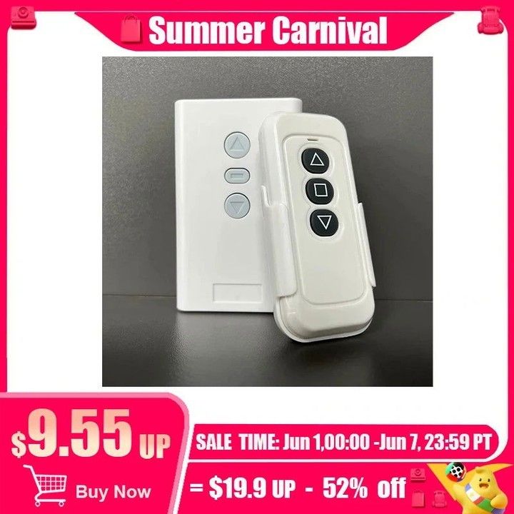 a white remote control sitting on top of a table next to a pink sign that says summer carnival