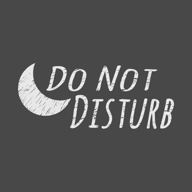 the words do not disturb written in chalk on a blackboard with a white crescent