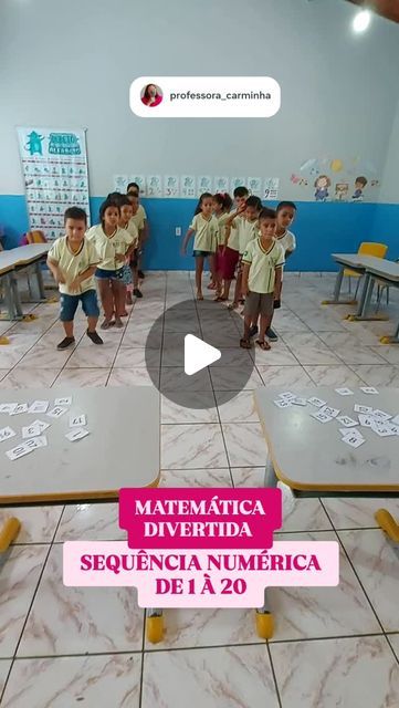 a group of young children standing in front of desks with paper cutouts on the floor