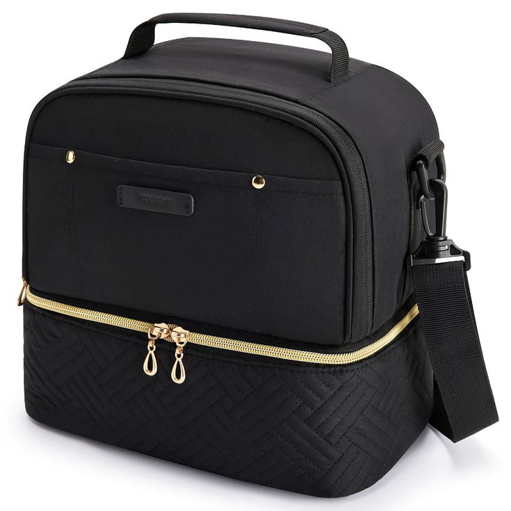 a black bag with gold zippers on the front and side, sitting against a white background