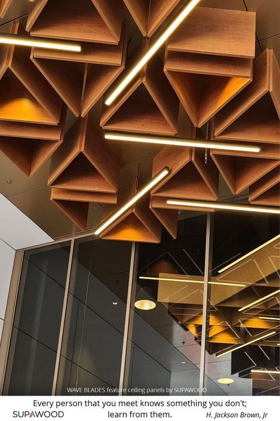 the ceiling is made out of wood and has lights hanging from it's sides