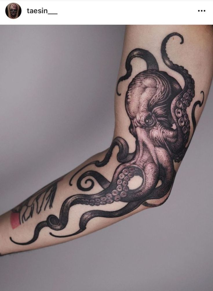 an octopus tattoo is shown on the arm