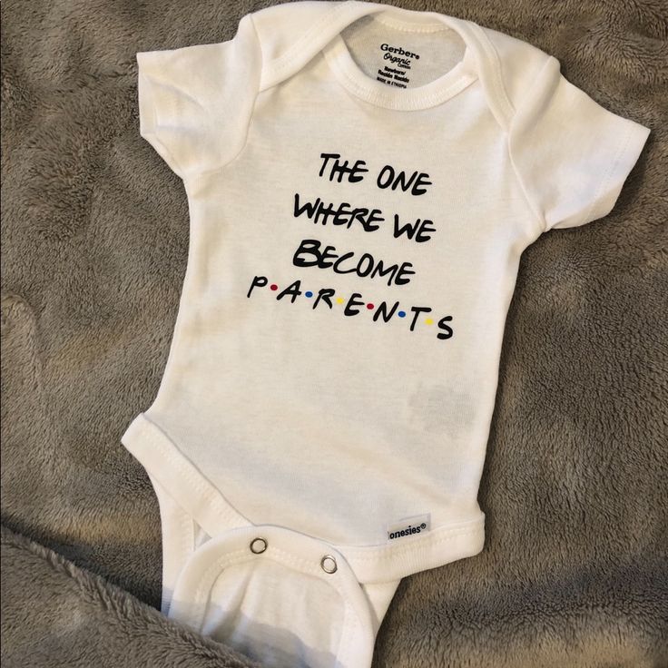 a white bodysuit with the words, the one where we become parents