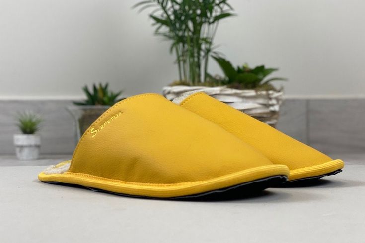 ~ Handmade, high quality and lasting yellow slippers for men. Available in big sizes. ~ Made of high quality genuine leather and natural merino wool, which let your skin breath and feet will not be sweating. It's a perfect gift for yourself and for your friends. ~ Sizing: Measure your foot by tracing it on a piece of paper. Make sure to keep the pencil/pen at 90 degrees to the surface of the paper. Measure the longest distance between your heel and toes. Slipper sizes according to the length of Comfortable Yellow Slip-on Slippers, Casual Yellow Slippers With Rubber Sole, Yellow Cushioned Slip-on Slippers, Comfortable Non-slip Yellow Slippers, Comfortable Yellow Non-slip Slippers, Comfortable Yellow Round Toe Slippers, Comfortable Leather Non-slip Slippers, Yellow Round Toe Indoor Slippers, Comfortable Non-slip Leather Slippers