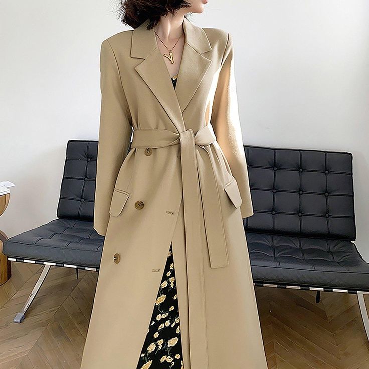 This elegant, beige double breasted trench coat is a must-have for any fashion-forward woman. Made with high-quality materials and a timeless design, it's perfect for staying stylish and comfortable in any weather. The double breasted button detail adds a touch of sophistication to this essential piece. ●Notched collar●front button closure with a removable belt ●Lined ●Cotton, polyester ●Machine wash, tumble dry★★Please advise your Height and Weight, I will make sure you choose the right size. Elegant Beige Belted Pea Coat, Elegant Belted Beige Pea Coat, Beige Belted Pea Coat For Work, Elegant Long Pea Coat For Spring, Elegant Spring Long Pea Coat, Elegant Long Spring Pea Coat, Beige Belted Pea Coat With Lapel Collar, Beige Double-breasted Pea Coat With Lapel Collar, Elegant Beige Double-breasted Outerwear