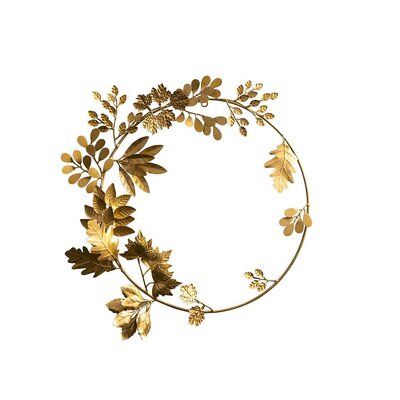 a gold leaf wreath on a white background