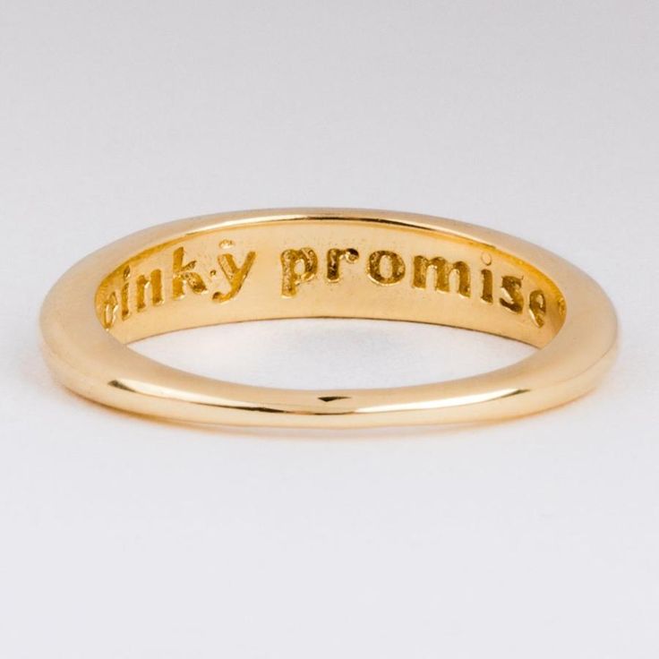 The Pinky Promise Ring is a perfectly discreet reminder of that promise to a friend or to yourself. Inscribed on the inside with the words "pinky promise" this little cutie is an adorable pinky ring, or minimal addition to any stack. 14K gold plated Brass base  3.7mm height in front 1.3mm in back 1mm band width Model w Pinky Promise Ring, Local Eclectic, Preppy Jewelry, Jewelry Accessories Ideas, Pinky Promise, Ringe Gold, Big Rings, Jewelry Lookbook, Domed Ring