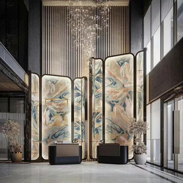 an artisticly designed room divider with chandelier in the middle and marble floors