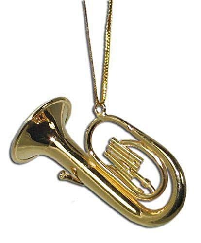 a gold necklace with a musical instrument on it