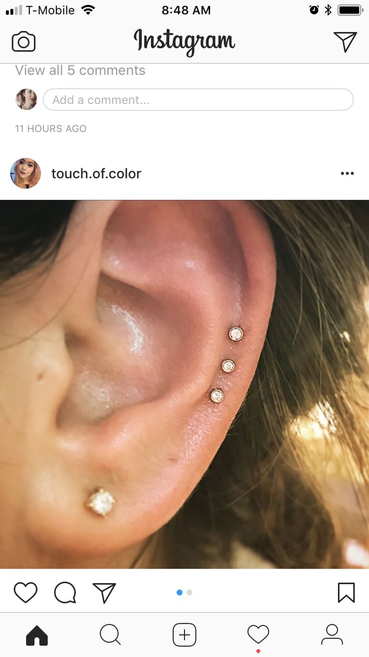 an instagram photo with the ear piercings on