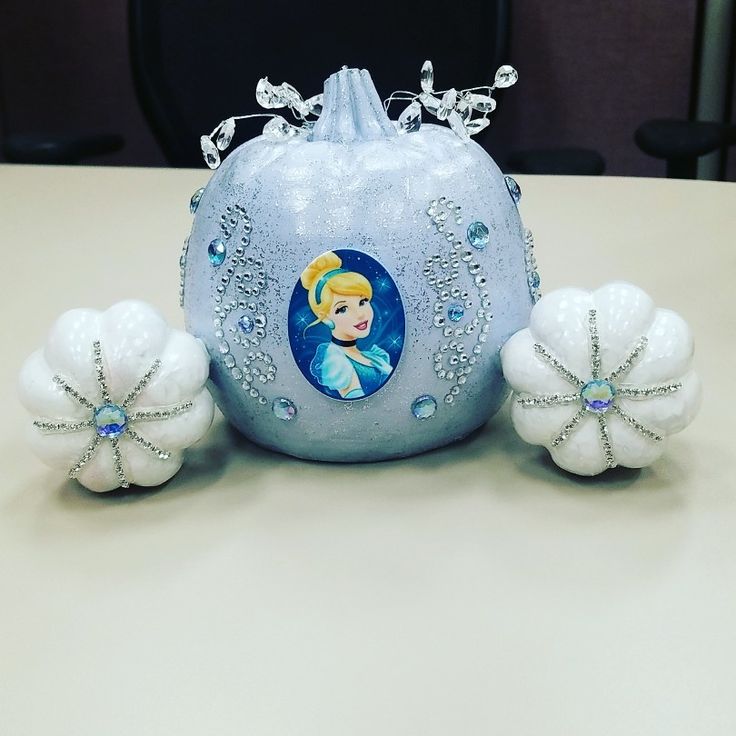 a white and blue purse sitting on top of a table