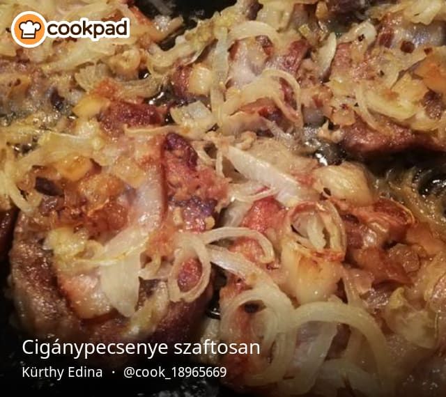 onions and meat cooking in a pan on the stove