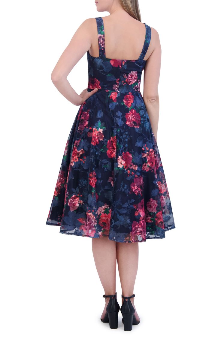 Bring the garden to the party in a blossom-tossed dress finished with a full skirt. 44" length (size 8) Hidden back-zip closure V-neck Lined 100% polyester Dry clean Imported Tea-length Floral Print Cocktail Dress, Cocktail Tea-length Floral Print Dress, Floral Print Cocktail Dress With Fitted Bodice, Fitted A-line Floral Dress For Garden Party, Floral Print Cocktail Dress With Sweetheart Neckline, Cocktail Dresses With Floral Print And Fitted Bodice, Cocktail Dress With Sweetheart Neckline And Floral Print, Floral Print Fit And Flare Midi Dress For Cocktail, A-line Garden Party Dress With Lined Bodice