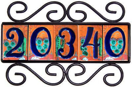 a metal sign with numbers and designs on it