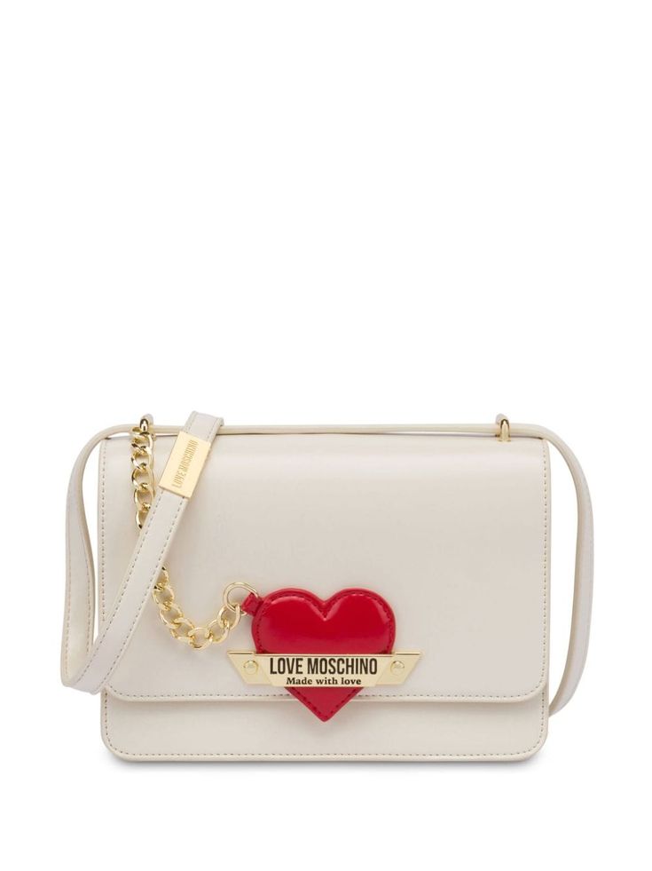 ivory white faux leather appliqué logo single shoulder strap foldover top with magnetic fastening main compartment internal patch pocket gold-tone hardware Designer White Flap Bag With Detachable Strap, White Shoulder Bag With Metal Logo For Evening, White Evening Bag With Metal Logo, Luxury Cream Bags With Logo, White Crossbody Shoulder Bag With Logo Hardware, Designer Crossbody Bag With Logo Plaque, Everyday Crossbody Shoulder Bag With Logo Plaque, Chic Cream Bags With Logo, Chic Crossbody Shoulder Bag With Logo