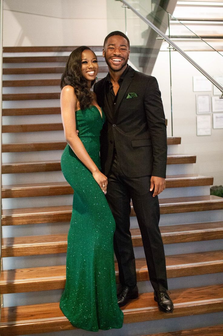 Green Dress And Black Suit Couple, Prom Guys Outfits Black, Emerald Green Homecoming Couple, All Black Suit With Green Tie, Green Prom Dress Black Couple, Green Prom Black Couple, Hoco Outfit Ideas For Couples, Green And Black Prom Couple, Emerald Green Couple Outfits