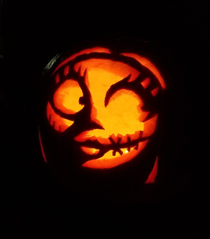 a pumpkin carved to look like jack o lantern