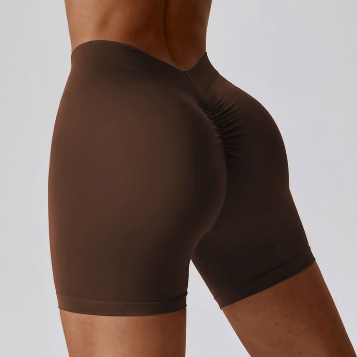 87% Nylon. 13% Spandex Soft. comfortable. skin friendly 4-way stretch. breathable and sweat-wicking Squat-proof Seamless fabric Back piece waist head V waist design Hip pumping pleat design. highlighting the peach buttocks Perfect for both sports activities and daily life Brown Athleisure Activewear With Built-in Shorts, Elastic Gym Bottoms, Elastic Fit Solid Color Gym Bottoms, Gym Bottoms With Built-in Shorts In Brown, Brown Gym Bottoms With Built-in Shorts, Brown Sporty Activewear With Elastic Waistband, Fitted Seamless Brown Bottoms, Brown Seamless Stretch Activewear, Fitted Brown Activewear For Pilates