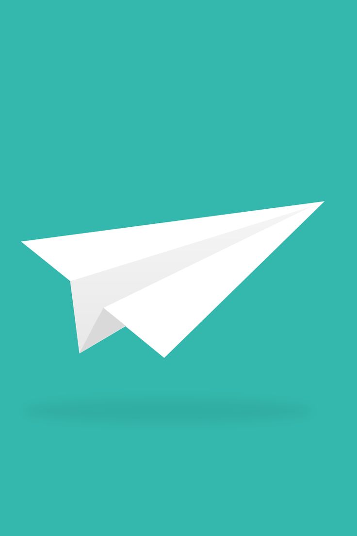 a paper airplane is flying in the sky on a green background with a long shadow