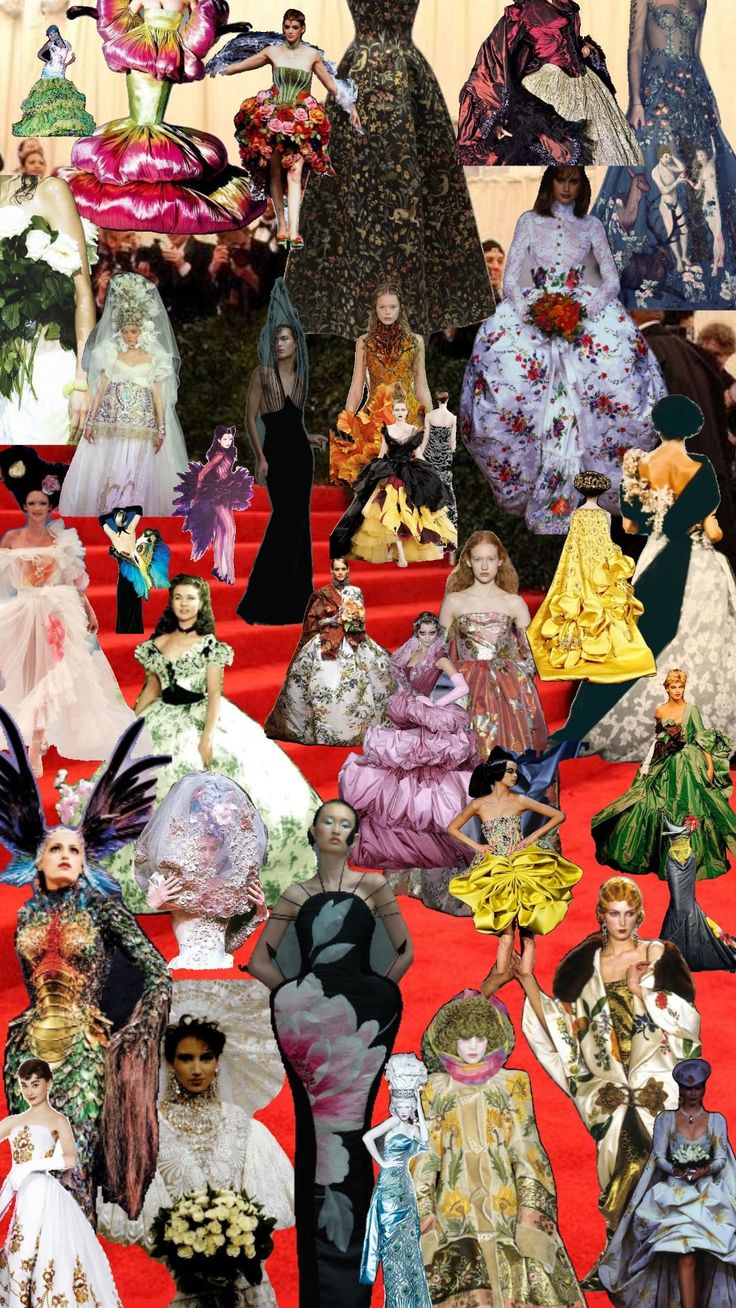 a large group of people dressed in fancy dresses and headdress on the red carpet