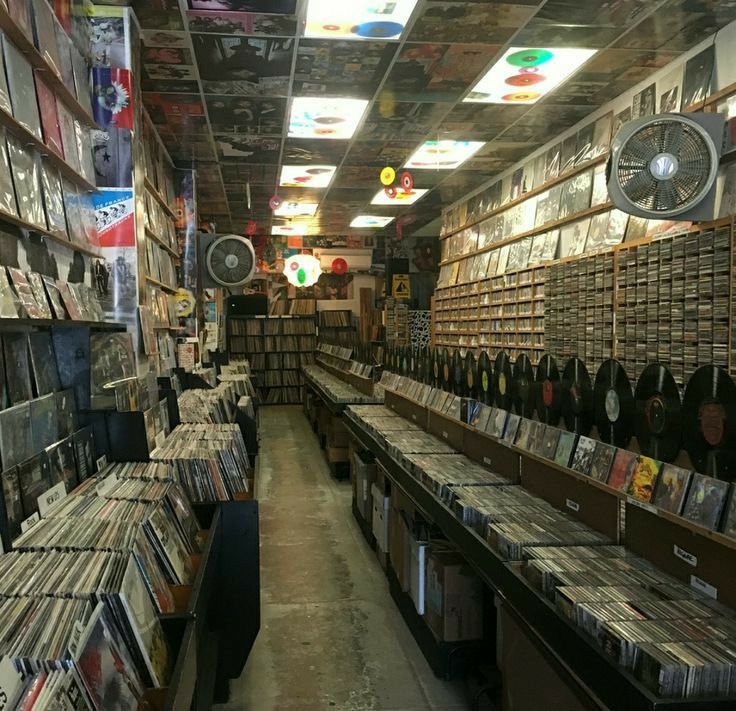 an old record store with lots of records on the shelves