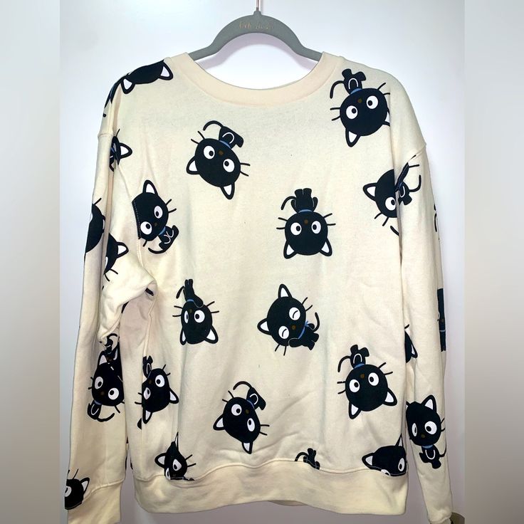 Hello Kitty, Cream Choco Cat Sweater, Never Worn Brand New Without Tags, Size Medium Casual Cat Print Sweater For Winter, Casual Winter Sweater With Cat Print, Casual Long Sleeve Tops With Cat Design, Cute Long Sleeve Sweatshirt With Cat Design, Cute Long Sleeve Sweatshirt With Cat Print, White Long Sleeve Sweatshirt With Cat Print, Casual Cat Design Tops For Fall, Casual Winter Tops With Cat Print, Casual Tops With Cat Design For Fall