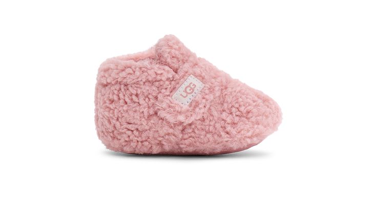 Our softest option for infants, the Bixbee wraps the littlest of feet in snuggly, curly fleece made from 51% recycled polyester. Featuring a hook-and-loop closure for easy on and off, it's finished with a slip-resistant rubber print on the microfiber outsole to help with their first steps. | Mix curly fleece (51% recycled polyester, 49% polyester) upper. Hook-and-loop closure. Mix fleece lining (51% recycled polyester, 49% polyester). Microfiber outsole with slip-resistant rubber print. 2.25 inc Baby Uggs, Rubber Print, Kids Uggs, Baby Boots, Crib Shoes, Woven Labels, Baby Booties, Ugg Australia, Terry Cloth