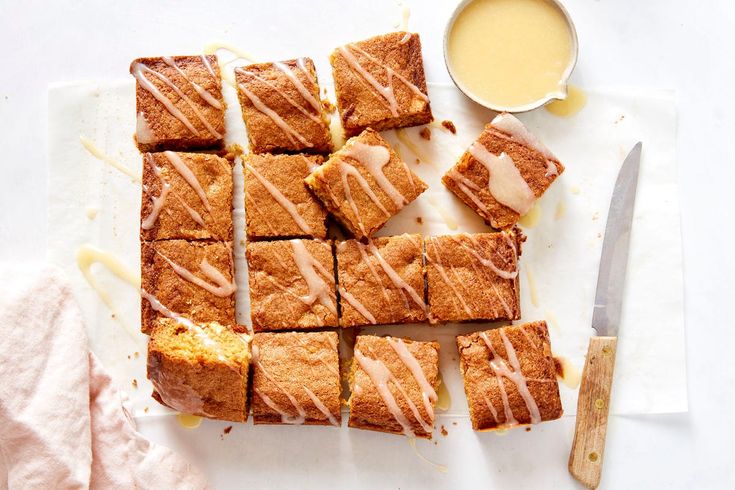 there are many pieces of cake on the cutting board