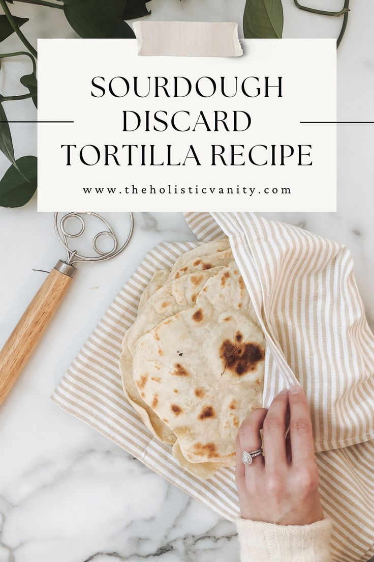 a person holding a tortilla on top of a marble counter with the words sourdough discard tortilla recipe