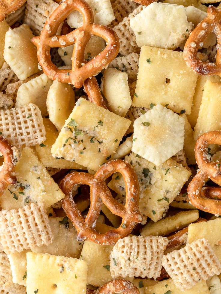 close up view of cheesy crackers and pretzels