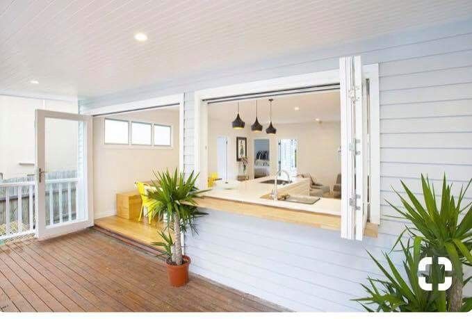 the inside of a house with wood floors and white walls