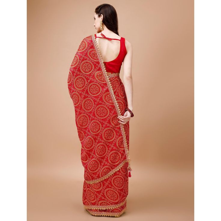 Red colored saree is prettified with beautiful bandhani printed with embroidered border work as shown which makes it appear classy. This saree is made of chiffon fabric which is accompanied with dola silk blouse piece which you can customise as per your design/style. Women can buy this saree to wear for their party and funcitons. Note:- The actual product may differ slightly in color and design from the one illustrated in the images when compared with computer or mobile scree Measurements: Saree : Chiffon : 5.5 Mtrs Blouse : Chiffon : 0.8 Mtr Material: Chiffon Stitch Type: Unstitched Country of Origin: India Care Guide: Dry Clean Printed Chiffon Saree, Saree Chiffon, Blouse Chiffon, Embroidered Border, Silk Lehenga, Chiffon Saree, Style Women, Print Chiffon, Chiffon Fabric