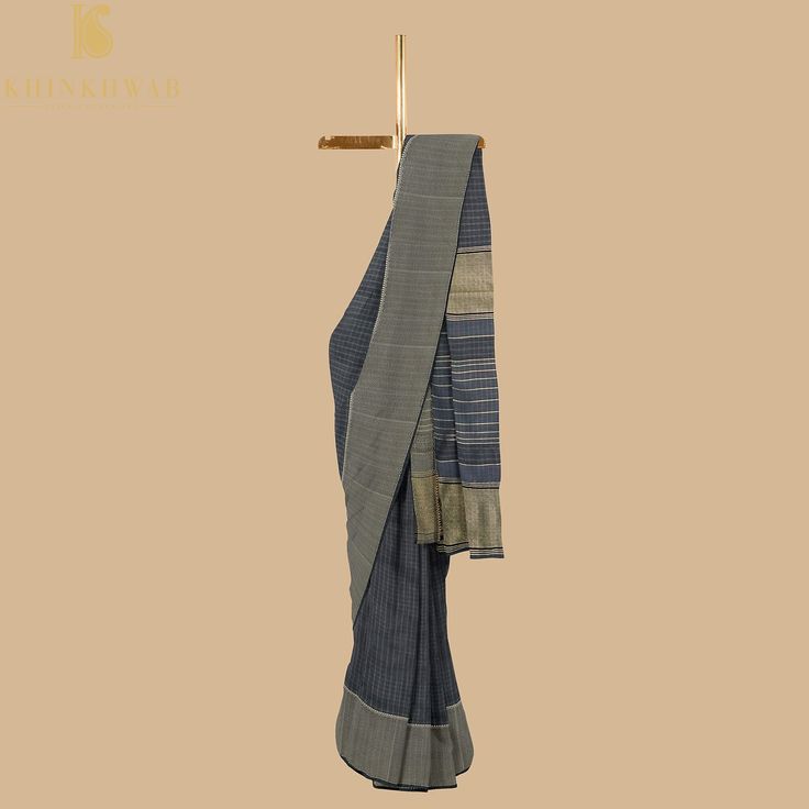 Khinkhwab brings you Maheshwari Sarees. Maheshwari handlooms owe their name to Maharani Ahilyabai Holkar, the ruler of the state of Indore in the late 18th century. Her reign was deemed the Golden Age, and she is revered by all at Maheshwar as Devi Ahilyabai or Ma Saab till date. Maheshwari handlooms derived their fine simplicity from this icon. It is said that under her artistic guidance, the craftspeople made light fabrics, detailed with motifs derived from carvings on the Maheshwar fort- a de Traditional Slub Silk Wear With Border, Raw Silk Saree With Weaving Work For Rituals, Handloom Anarkali For Rituals, Transitional Season Handloom Pre-draped Saree For Traditional Ceremonies, Transitional Cotton Silk Traditional Wear For Rituals, Rituals Raw Silk Saree With Weaving Work, Traditional Chanderi Pre-draped Saree With Weaving Work, Traditional Drape Saree With Border For Rituals, Rituals Saree With Border