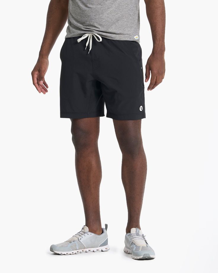 One short for every sport, the Kore Shorts have a classic athletic fit, falling just above the knee with an anywhere and everywhere versatility. Go commando in confidence with the breathable, boxer-brief liner. Also available in 5" and 9" inseam and unlined. | Vuori Kore Shorts | Black | XS Vuori makes premium performance apparel inspired by the active Coastal California lifestyle; an integration of fitness, surf, sport, and art. Breaking down the boundaries of traditional activewear, we are a n Casual Training Shorts With 5-inch Inseam, Casual Athletic Shorts With 5-inch Inseam For Sports, Casual Gym Shorts With 5-inch Inseam, Casual Athletic Shorts For Workout With 5-inch Inseam, Relaxed Fit Swim Trunks With Built-in Shorts For Sports, Sporty Workout Athletic Shorts With 5-inch Inseam, Relaxed Fit 5-inch Inseam Sports Activewear, Casual 5-inch Inseam Athletic Shorts For Sports, Nylon Athleisure Shorts With Comfort Waistband