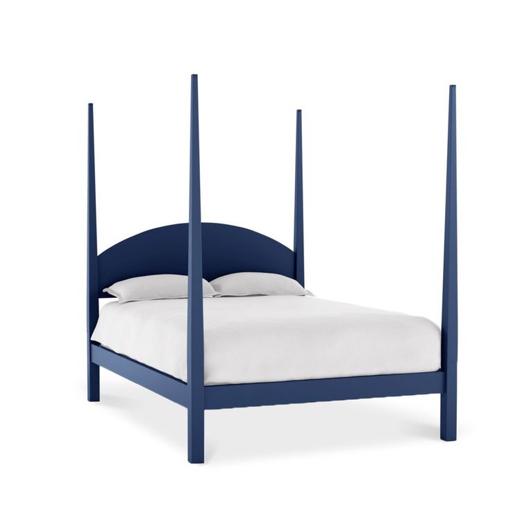 a blue bed frame with white sheets and pillows on top of it, in front of a white background