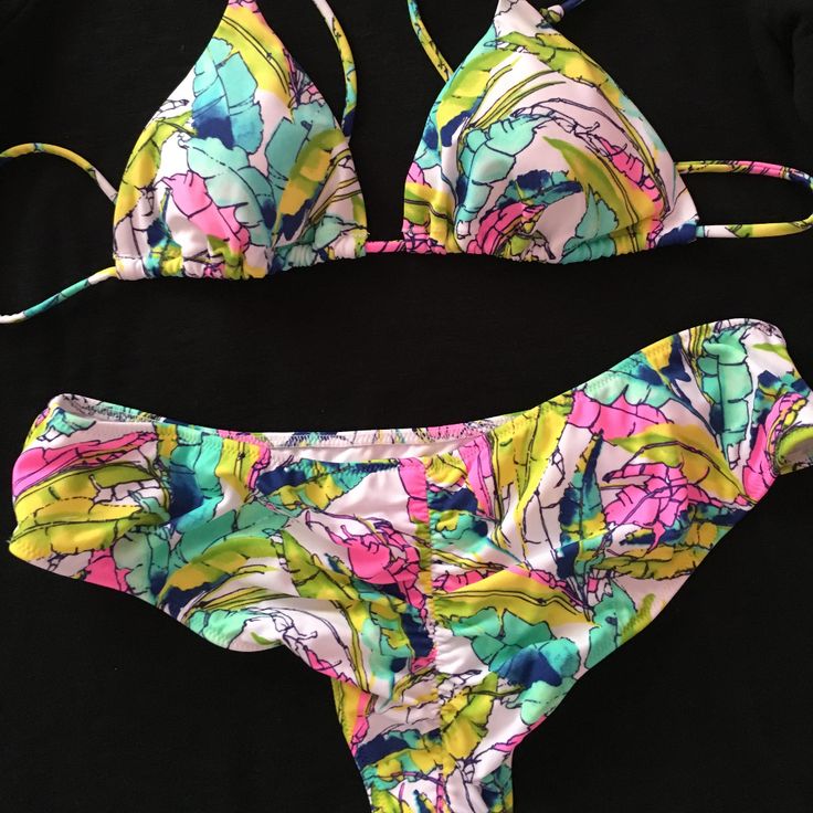 Victoria's Secret Triangle Bikini Top Ruched Bikini Bottom Set Brand New Without Tags. Never Worn. Tropical Palm Leaf Print With Bright Summer Colors. Size Small. Fully Lined, Top Has Removable Padding, Ties At Back, Halterneck Ties, All Over Cute Bright Tropical Palm Print. Smoke & Pet Free Home. Fitted Printed Swimwear For Summer Parties, Pink Summer Tankini With Tropical Print, Pink Tropical Print Summer Tankini, Pink Tropical Print Tankini For Vacation, Pink Tankini With Tropical Print, Stretch Tropical Print Triangle Top Swimwear, Multicolor Printed Swimwear For Summer Parties, Tropical Printed Swimwear For Summer Parties, Stretch Triangle Top Swimwear With Tropical Print