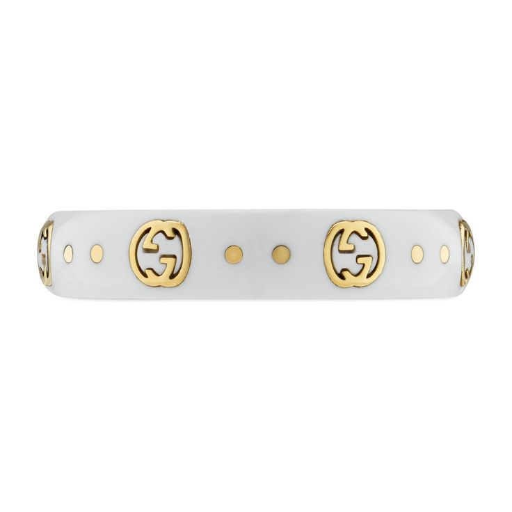 The Gucci Icon collection reprises one of the House's most emblematic motifs. The Interlocking G, representative of Founder Guccio Gucci's initials, is presented in 18k yellow gold, contrasting against a white synthetic corundum band. 18k yellow gold and white synthetic corundum Interlocking G engraving in gold .2" width This ring is a size 8 Made in Italy Gucci Style #: YBC679262002017 Gucci 14k Gold Designer Rings, Gucci Designer Rings In 14k Gold, Designer Gucci 14k Gold Rings, Elegant Gucci Yellow Gold Rings, Luxury Hallmarked Gucci Rings, Designer Yellow Gold Jewelry With Logo, Gucci Gold 14k Gold Rings, Classic Gucci Yellow Gold Ring, Gucci 14k Gold Rings