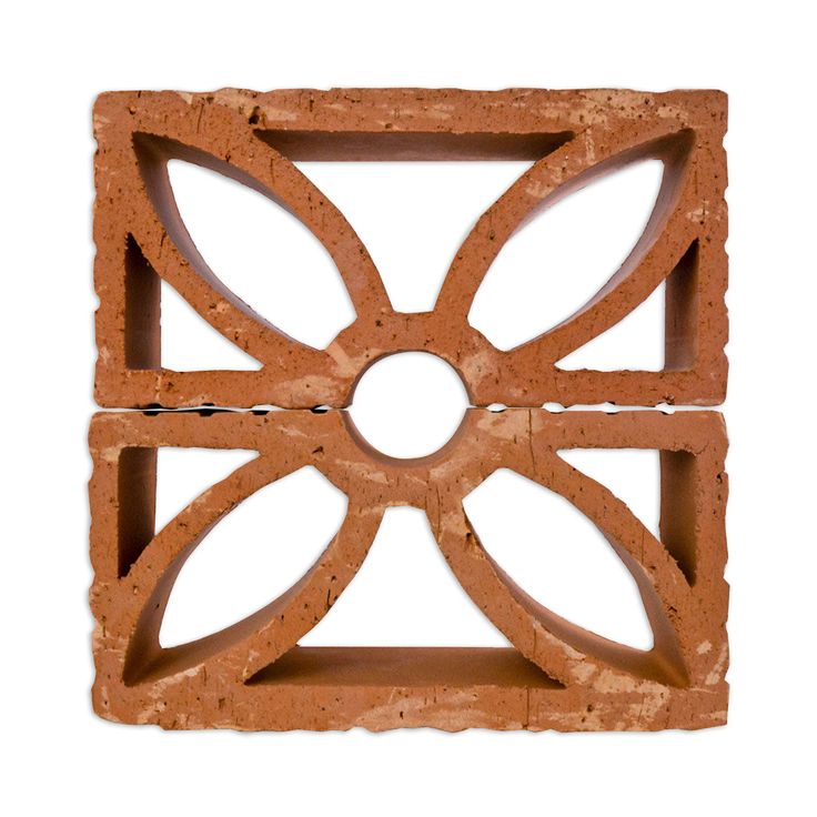 a square object made out of bricks with an intricate design on the top and bottom