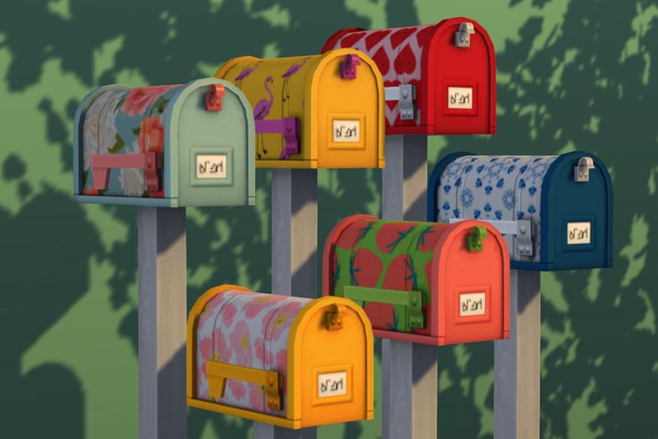 several mailboxes are lined up in different colors