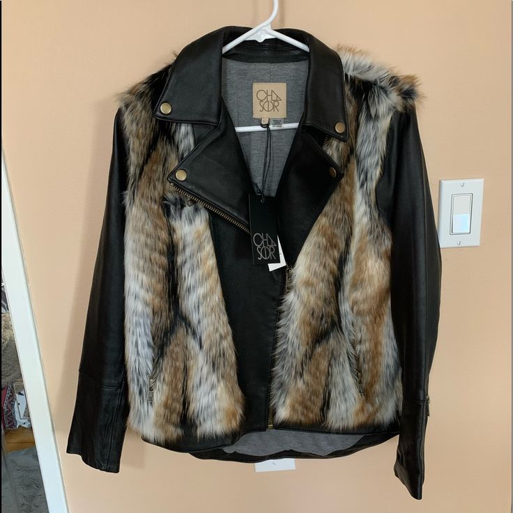 Chaser Faux Fur And Leather Jacket. Multi Colored Faux Fur And Faux Leather Jacket, Fully Lined. Zipper Up Front With Zipper Pockets And Small Chest Pocket. Super Soft And Totally Fashionable! Size Large. Chic Faux Fur Biker Jacket For Fall, Faux Fur Lined Biker Jacket For Fall, Chic Faux Fur Leather Jacket With Trim, Faux Fur Biker Jacket For Fall, Faux Fur Lined Leather Jacket For Fall, Fur And Leather Jacket, Drape Front Jacket, Burgundy Jacket, Fringe Leather Jacket