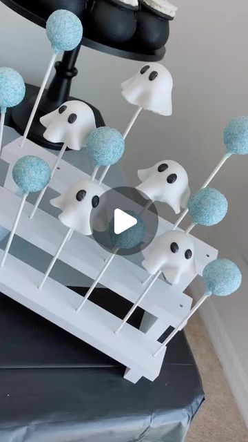 there are some cake pops in the shape of ghost