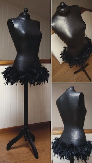 the mannequin is made up of black feathers