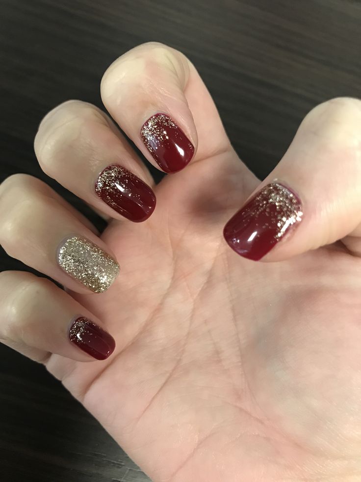 Christmas Nails With Burgundy, Dark Red And Rose Gold Nails, Red And Silver Sparkly Nails, Dark Red With Gold Nails, Red And Gold Manicure, Burgundy And Glitter Nails, Cranberry And Gold Nails, Red And Gold Sparkle Nails, Deep Red And Gold Nails