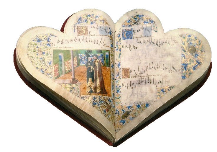 an open book in the shape of a heart with pictures on it's pages