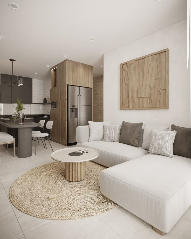 a living room filled with furniture and a white rug