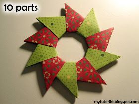 an origami christmas wreath made with red and green paper