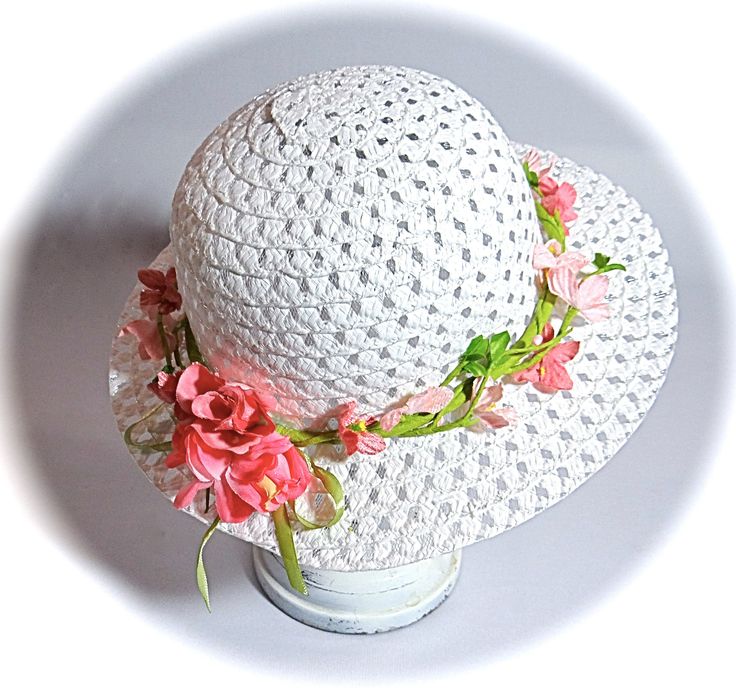 "This little girls Easter bonnet or tea party hat is a white open weave sun hat with a wired leaf green garland that wraps the crown.  The garland is sprinkled with velvet flowers in shades of pink.  The hat is perfect for Easter or a flower girl in a garden wedding!  This hat measures 20-1/2\" at the crown...be sure to measure mid forehead before ordering!  To view my entire collection of Girl's Hats click on this Section.... https://www.etsy.com/your/shops/Marcellefinery/sections/16935555 Prev Handmade Pink Mini Hats For Spring, Adjustable Flower Sun Hat For Spring, Spring Sun Hat With Curved Brim, Spring Sun Hat With Curved Brim As Gift, Brimmed Sun Hat For Spring, Spring Gift Sun Hat With Curved Brim, Flower Shaped Sun Hat For Garden Party, Adjustable Sun Hat For Spring Gift, Bohemian White Sun Hat For Garden Party